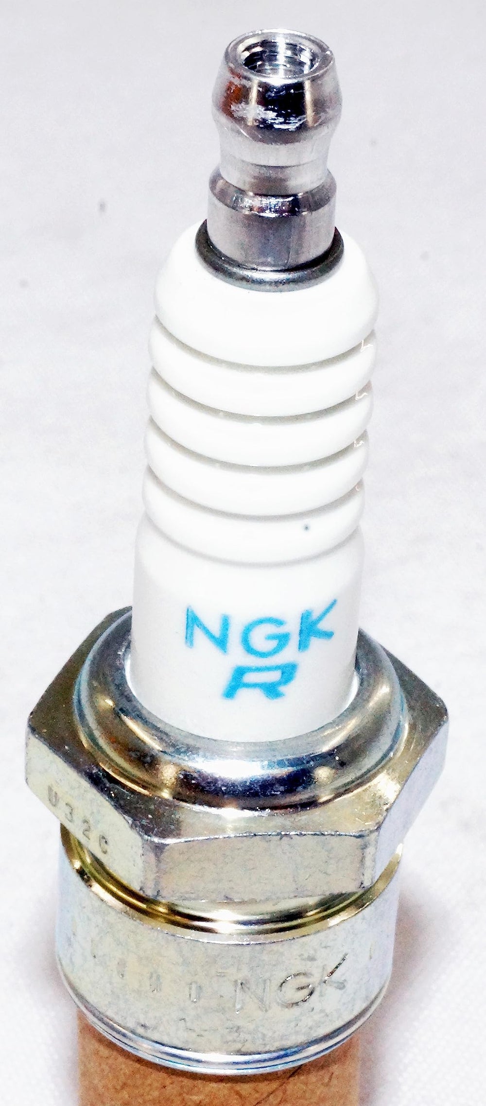 NGK BR8HS-10 installed in plug well showing proper seating benefit