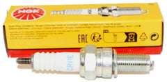 NGK close-up of CR8E electrode and insulator displaying precise tip for reliable spark