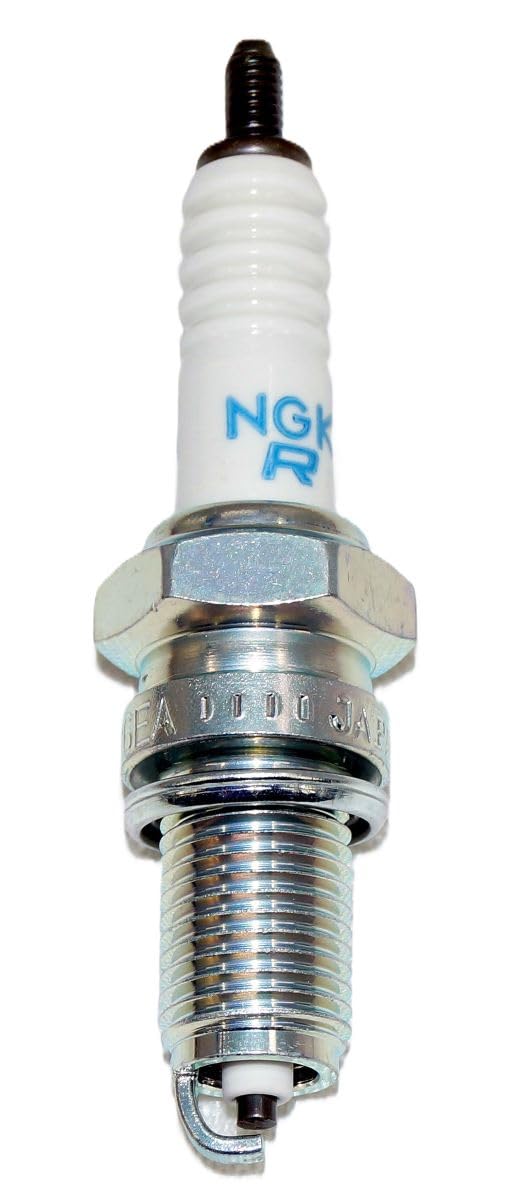 NGK DPR6EA-9 next to ruler to show reach and overall size
