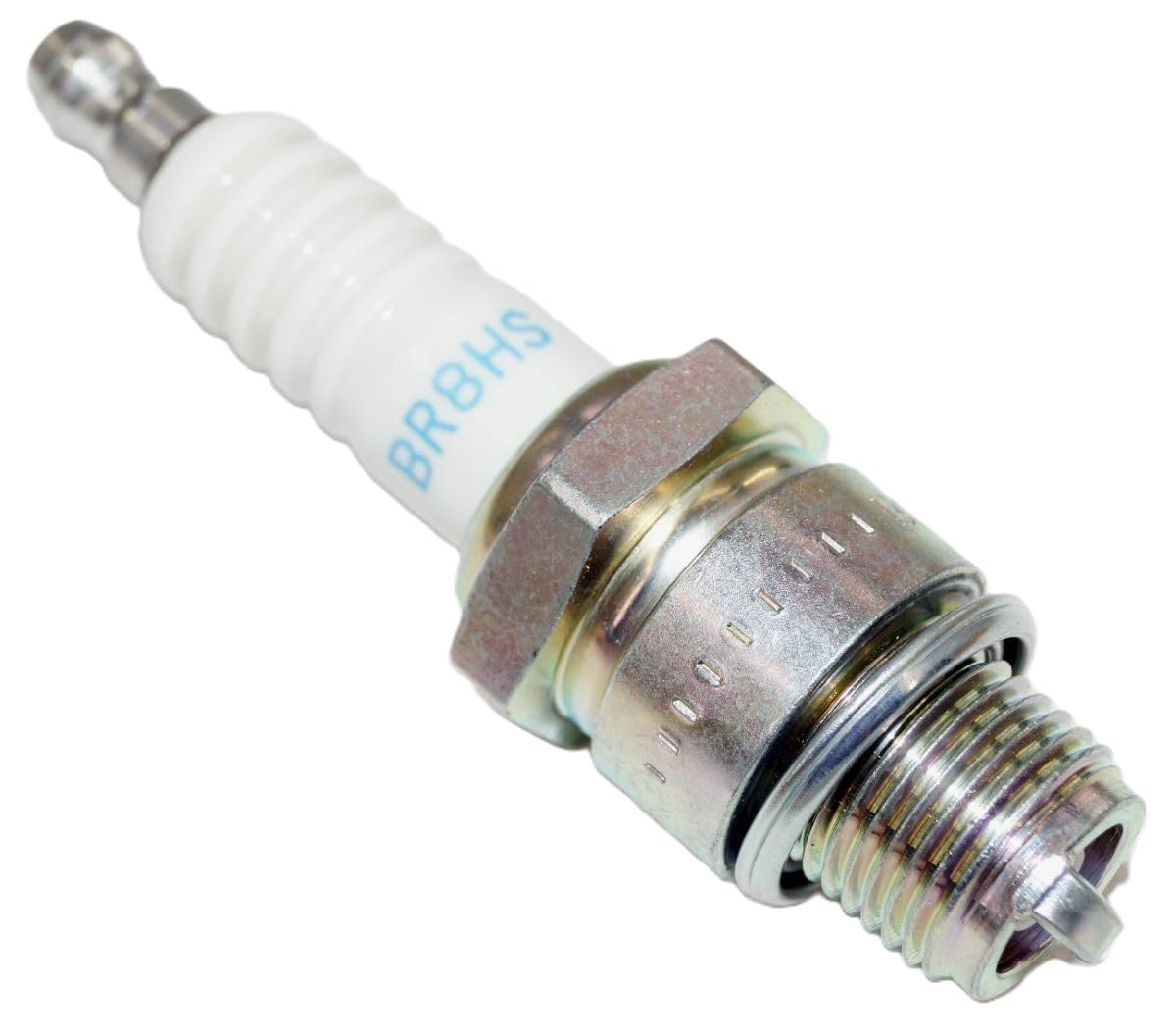 NGK four-pack contents laid out showing included plugs for full-cylinder replacement convenience