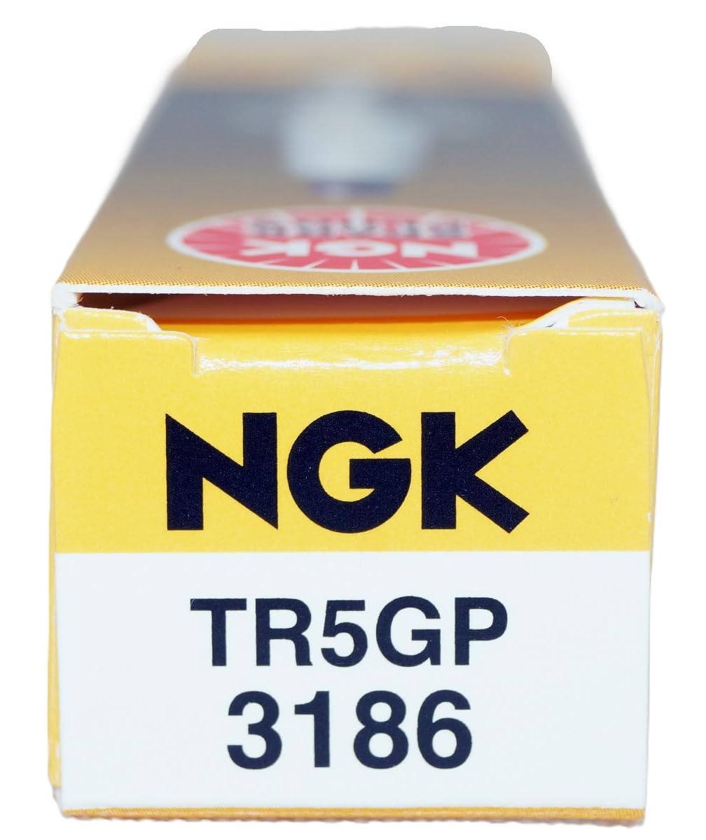 NGK plug installed in an engine socket to show fitment and straightforward replacement