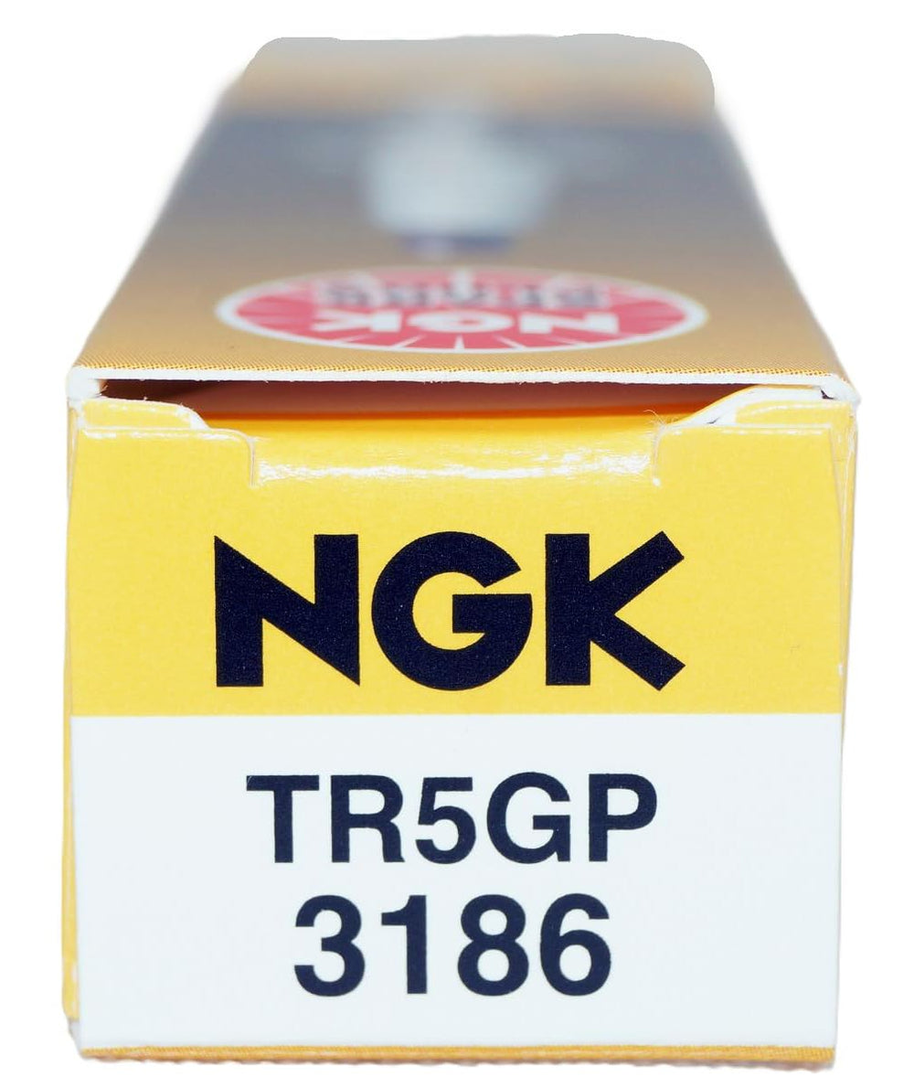 NGK plug installed in an engine socket to show fitment and straightforward replacement