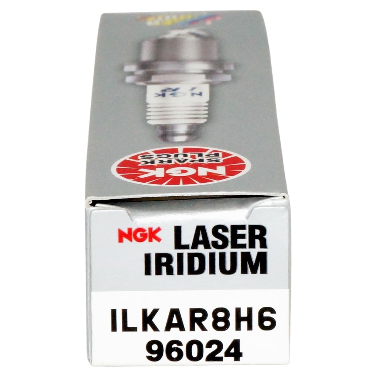 NGK ILKAR8H6 set on workbench in garage showing ready-for-install convenience