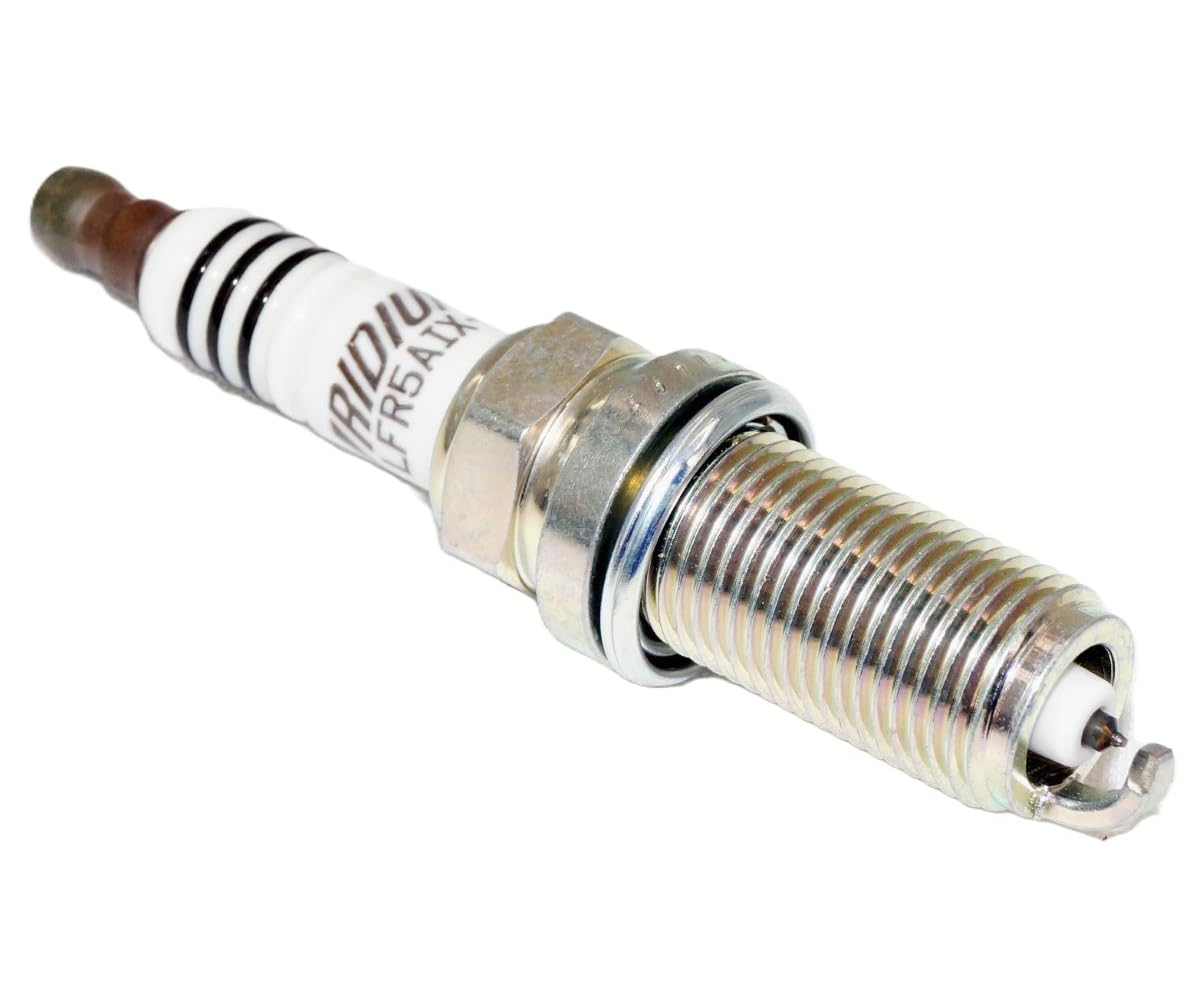 NGK spark plug installed in engine demonstrating fit and reliable combustion