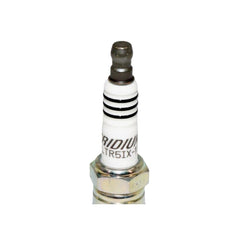 NGK spark plug installed in engine cylinder head illustrating easy replacement benefit