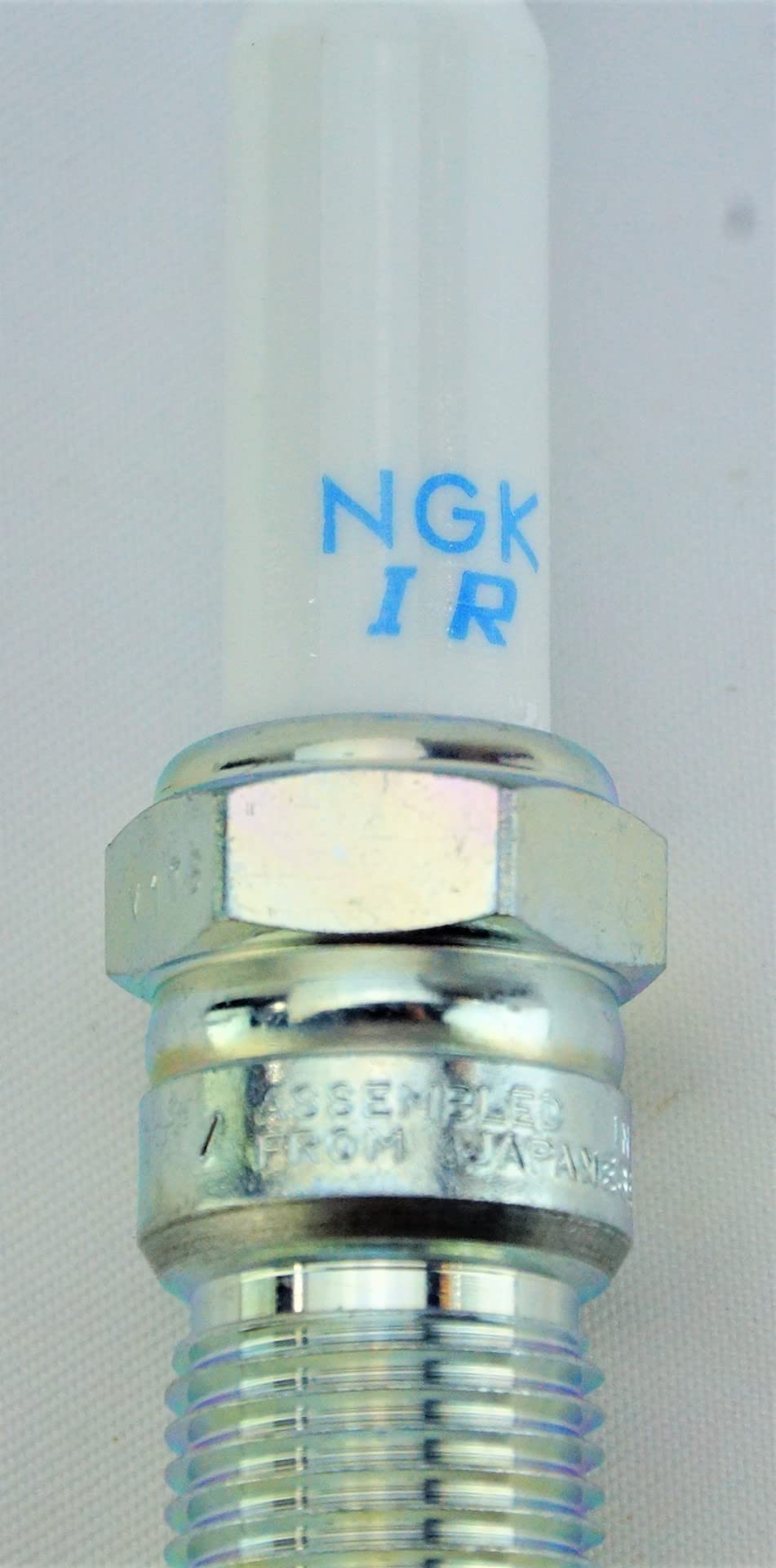 NGK plugs in garage installation scene illustrating professional use