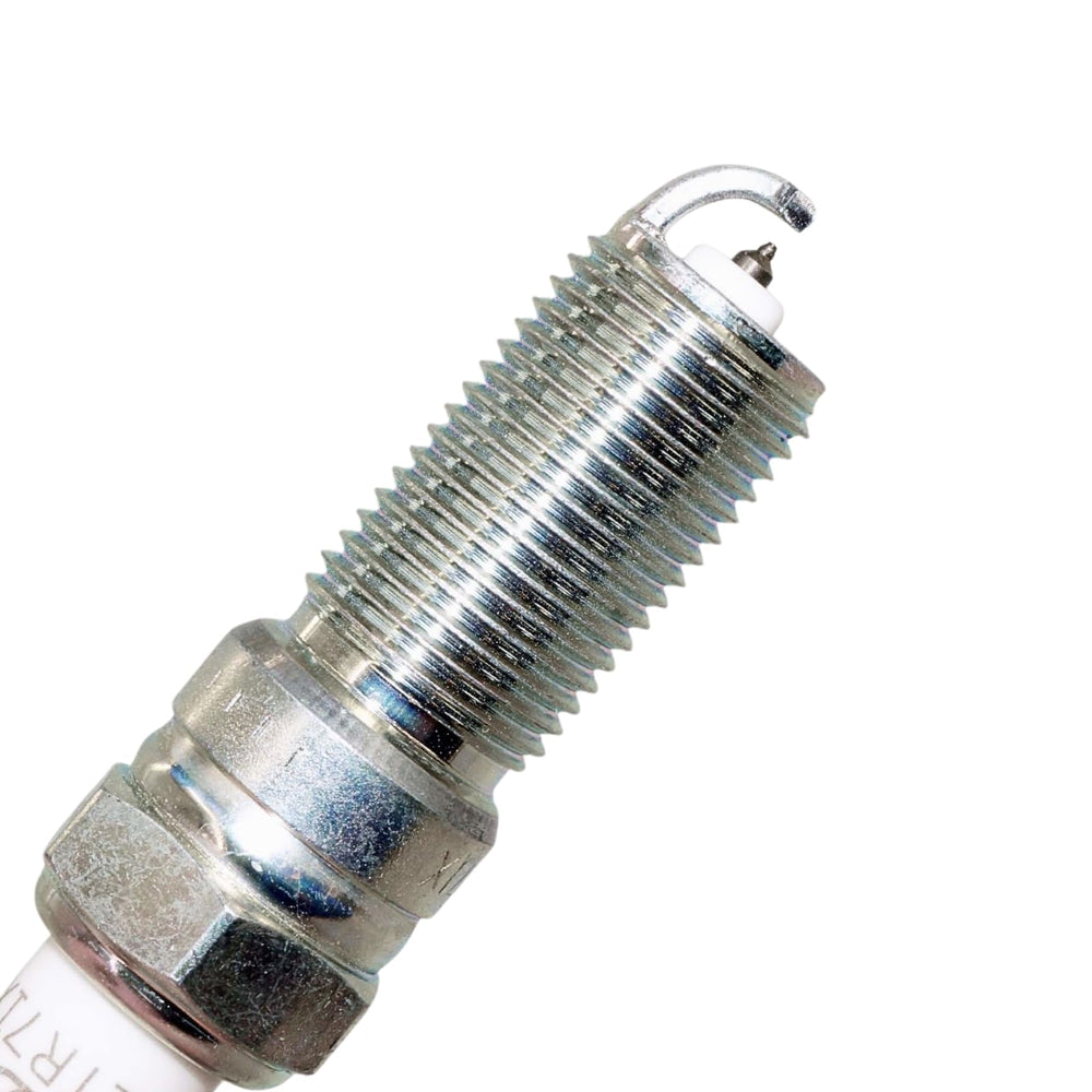 NGK electrode detail close-up showing fine iridium center electrode longevity