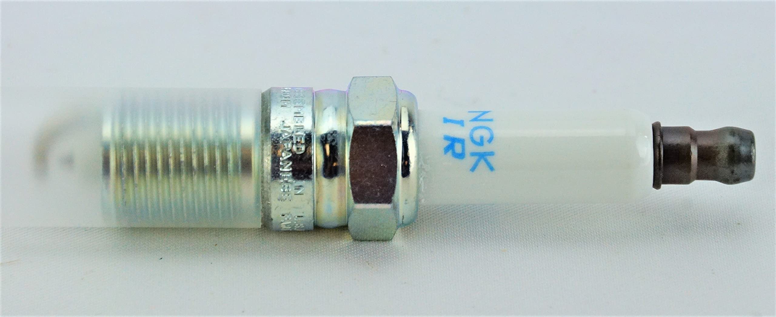 NGK plug thread and reach detail showing correct fit precision