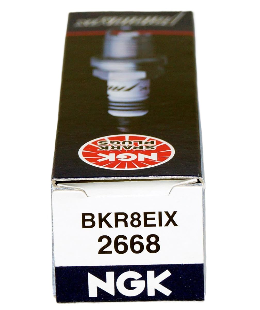 NGK spark plugs installed in engine bay showing reliable ignition performance