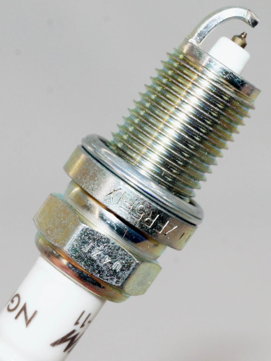 NGK plugs installed in cylinder head demonstrating proper fit
