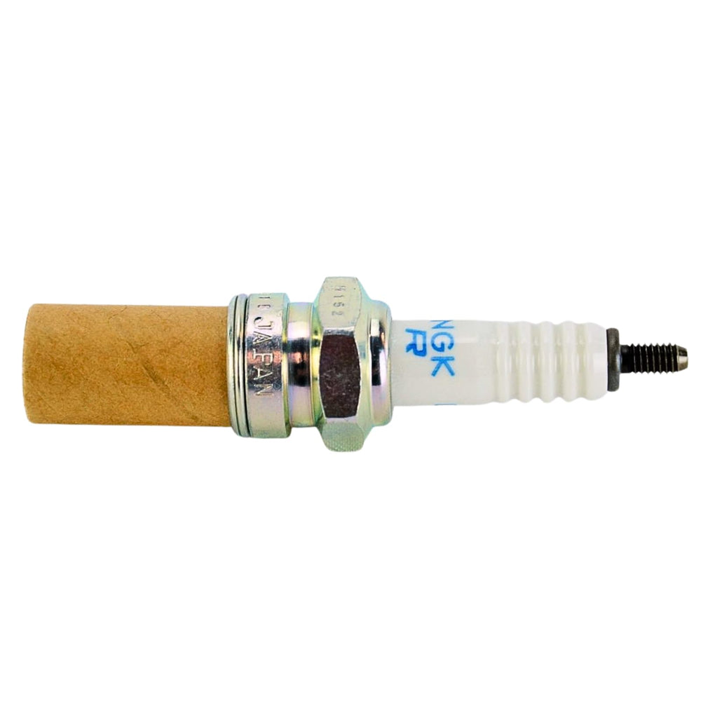 NGK close-up of spark plug electrode and insulator showing durable construction benefit