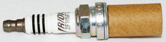 NGK spark plug with correct gap ready for accurate installation