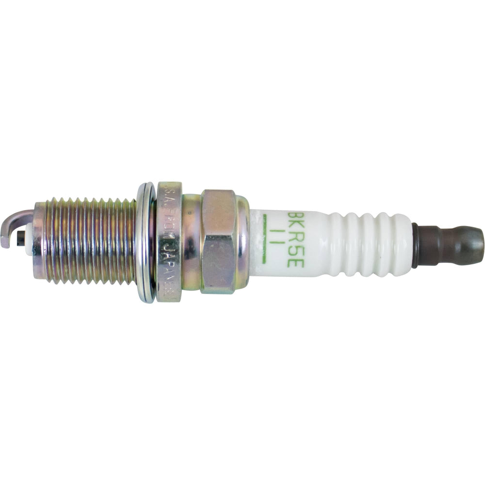 NGK spark plug held in hand illustrating size and fit confirmation