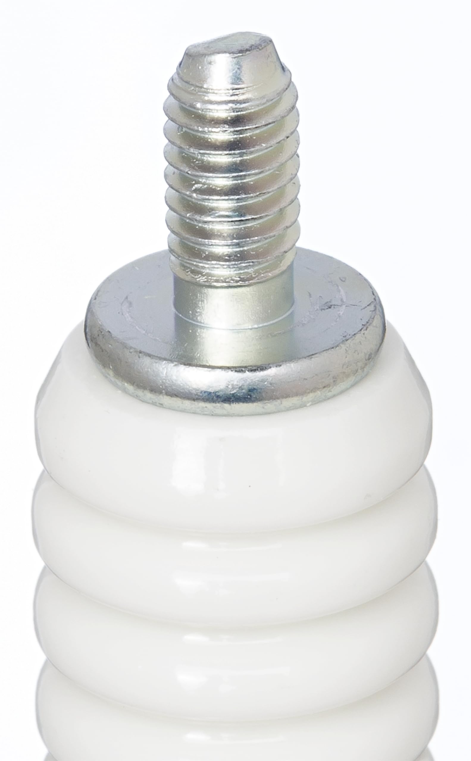 NGK spark plug installed in an engine bay demonstrating proper fit and reliable ignition