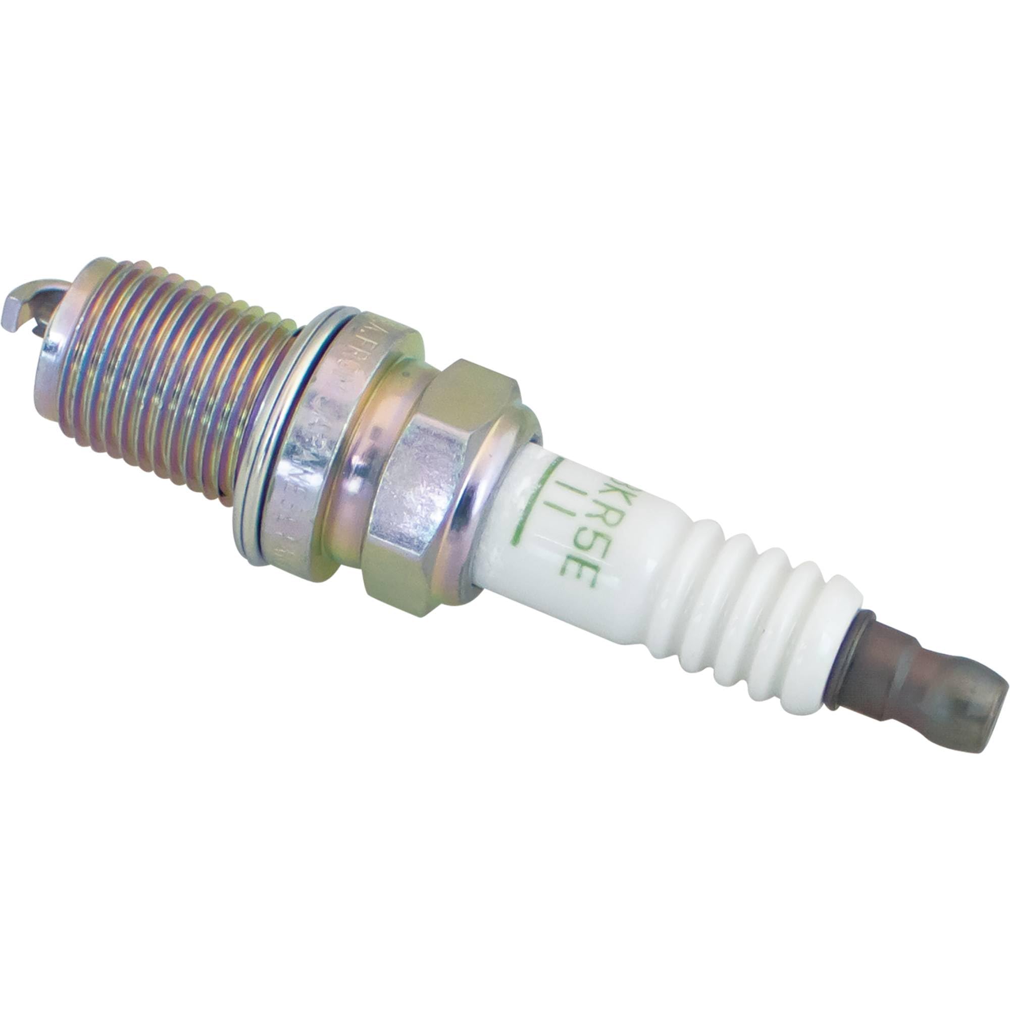 NGK spark plug installed in engine compartment showing fitment benefit
