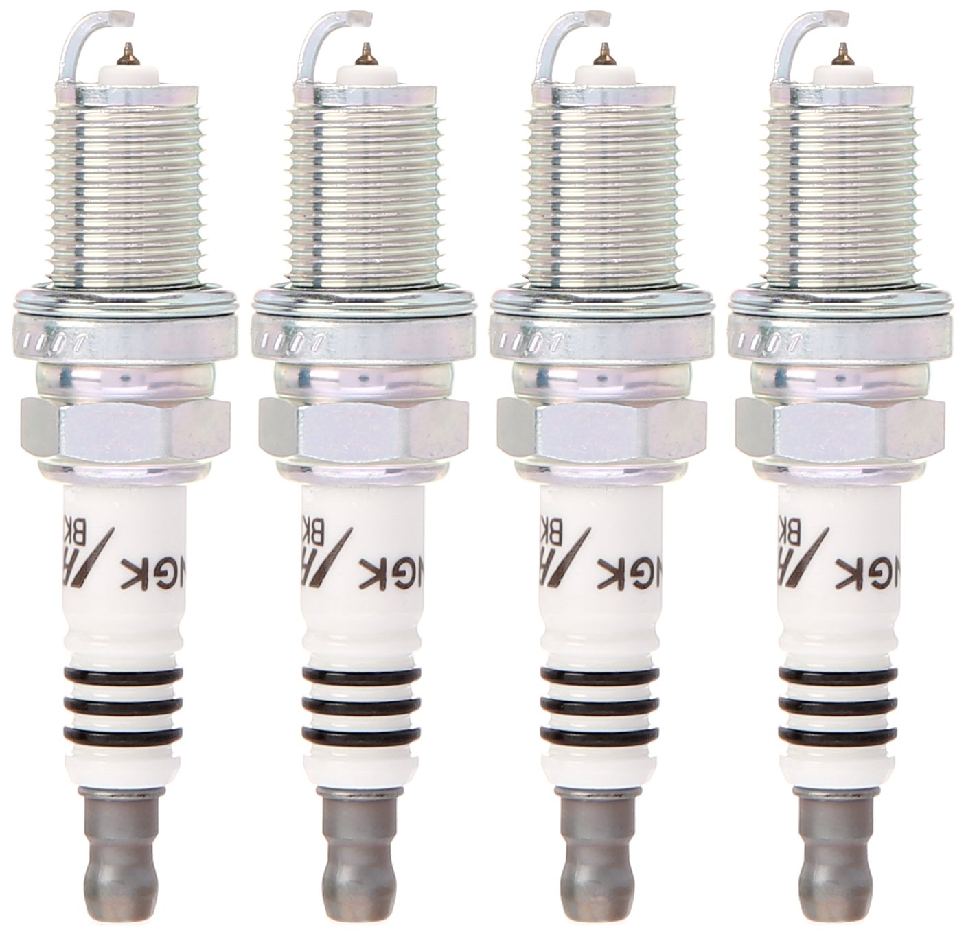 NGK spark plug installed in engine bay presenting fitment and improved throttle response