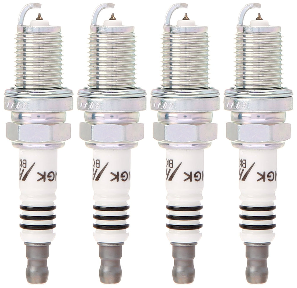 NGK spark plug installed in engine bay presenting fitment and improved throttle response