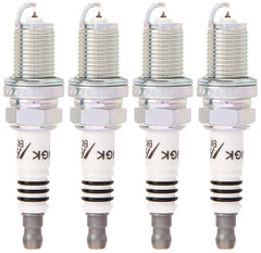 NGK spark plug installed in engine bay presenting fitment and improved throttle response