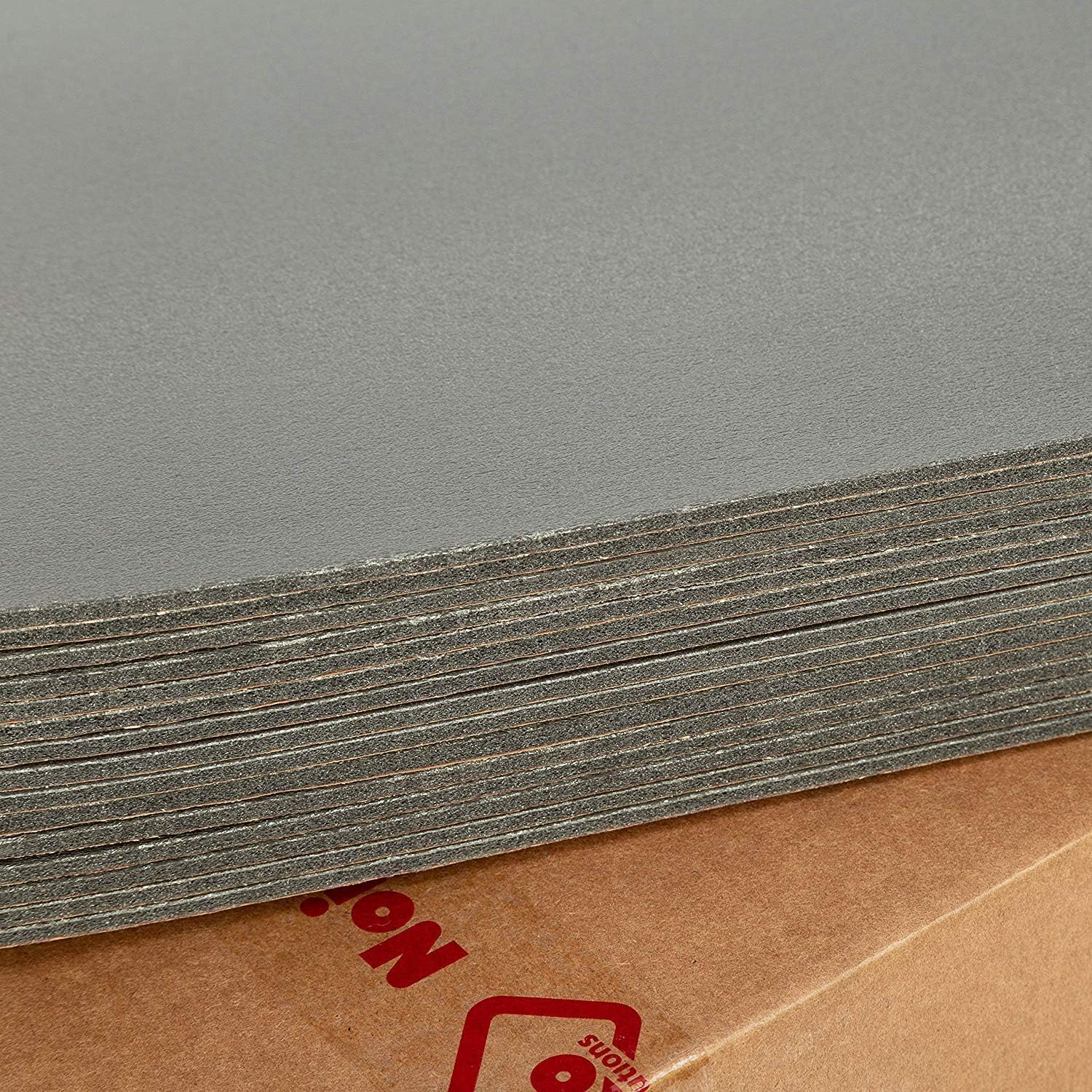 Noico Solutions Red installed inside car door illustrating reduced rattles and improved comfort