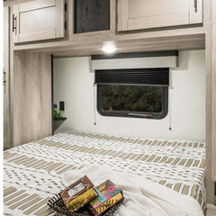 NOVINO in-use window with shade raised and lowered for adjustable light
