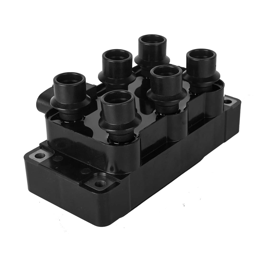 NPAUTO coil pack next to spark plug to show correct firing alignment