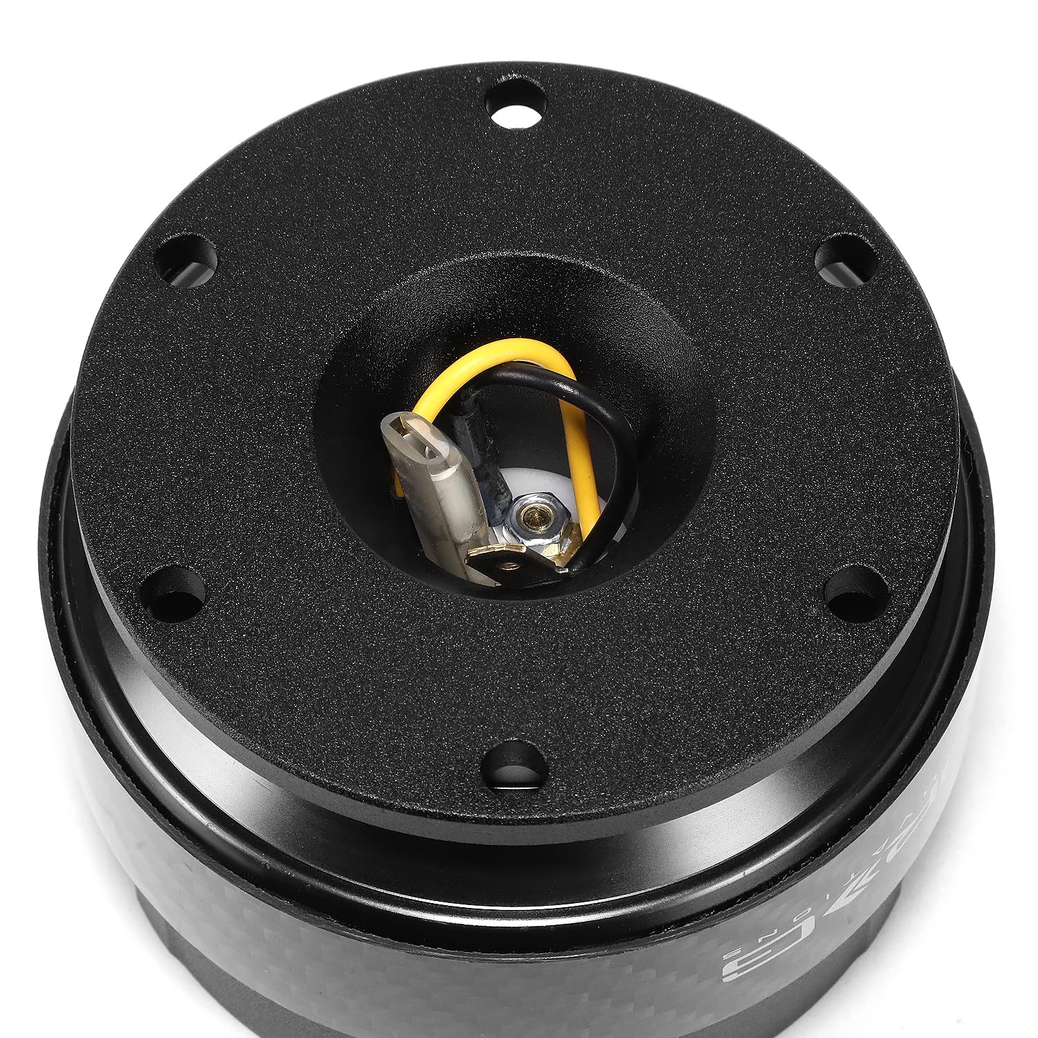 NRG Innovations quick release next to ruler to show scale and compactness for cockpit clearance