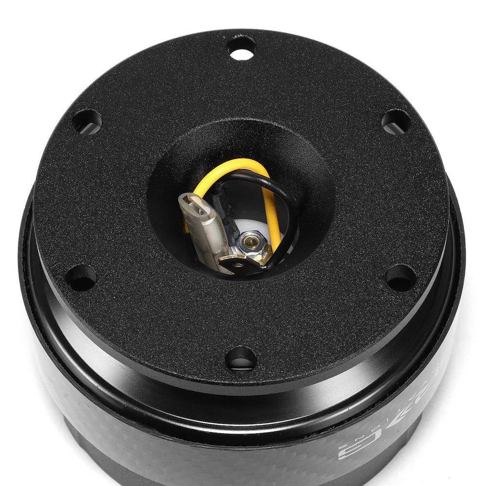 NRG Innovations quick release next to ruler to show scale and compactness for cockpit clearance
