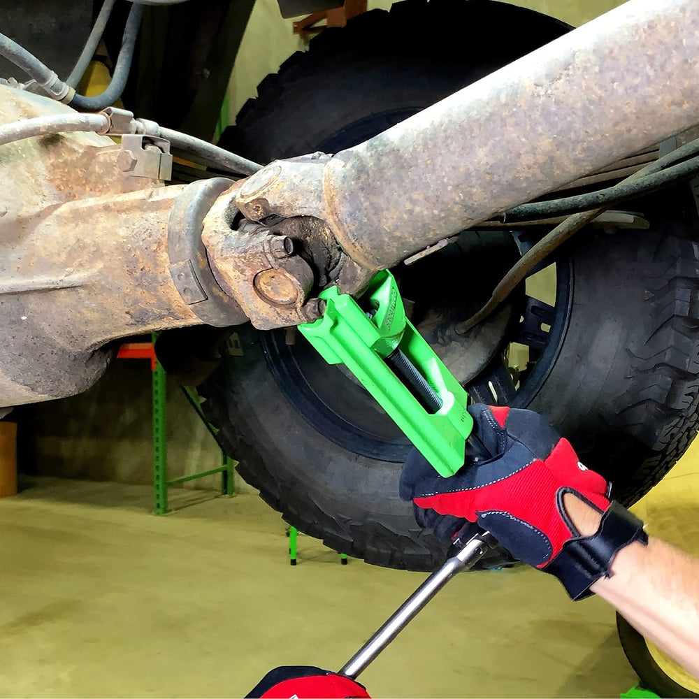 OEMTOOLS in use removing seized bearing cup, reducing risk of damage