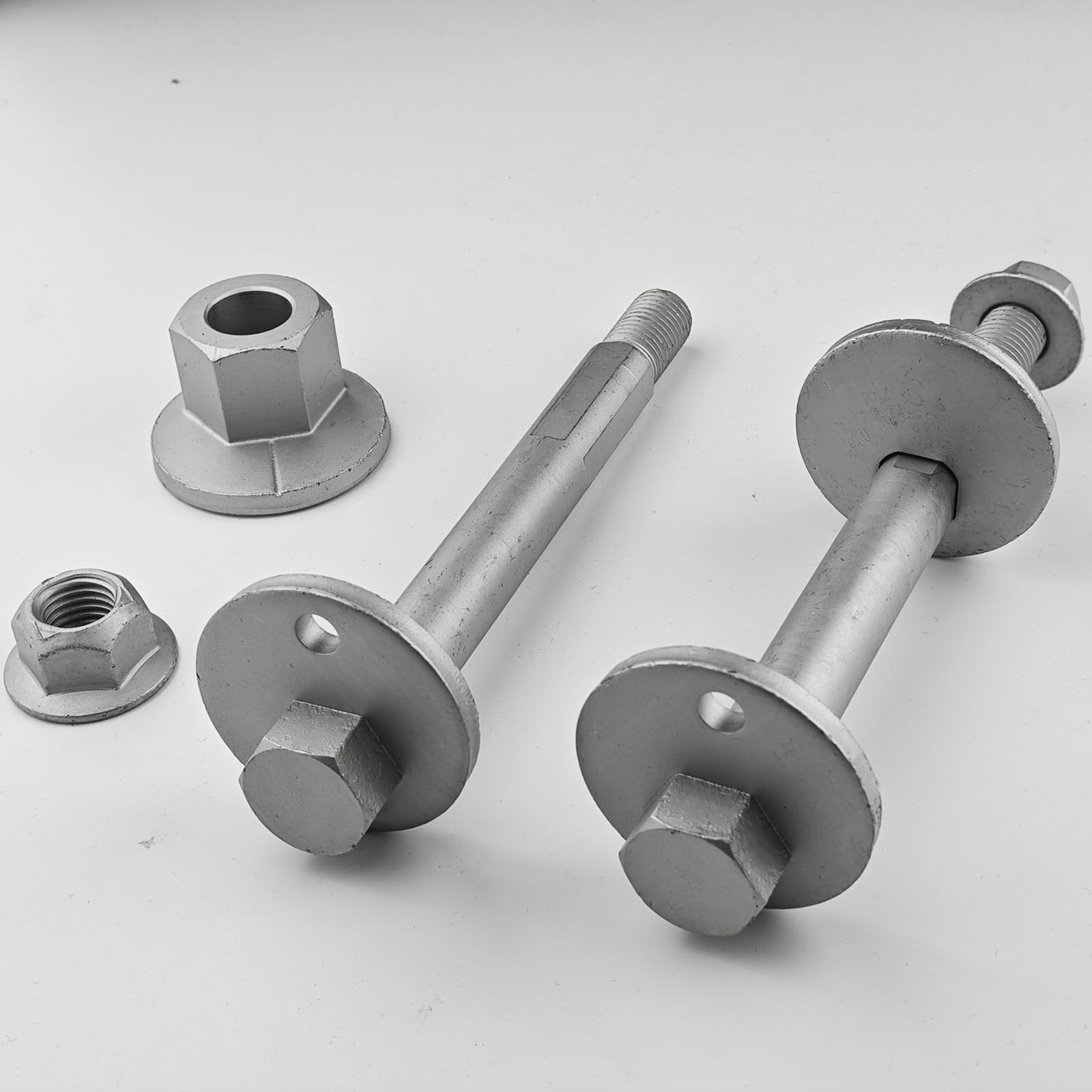 OEMUTA camber bolt next to ruler for scale, helps confirm correct size and fit