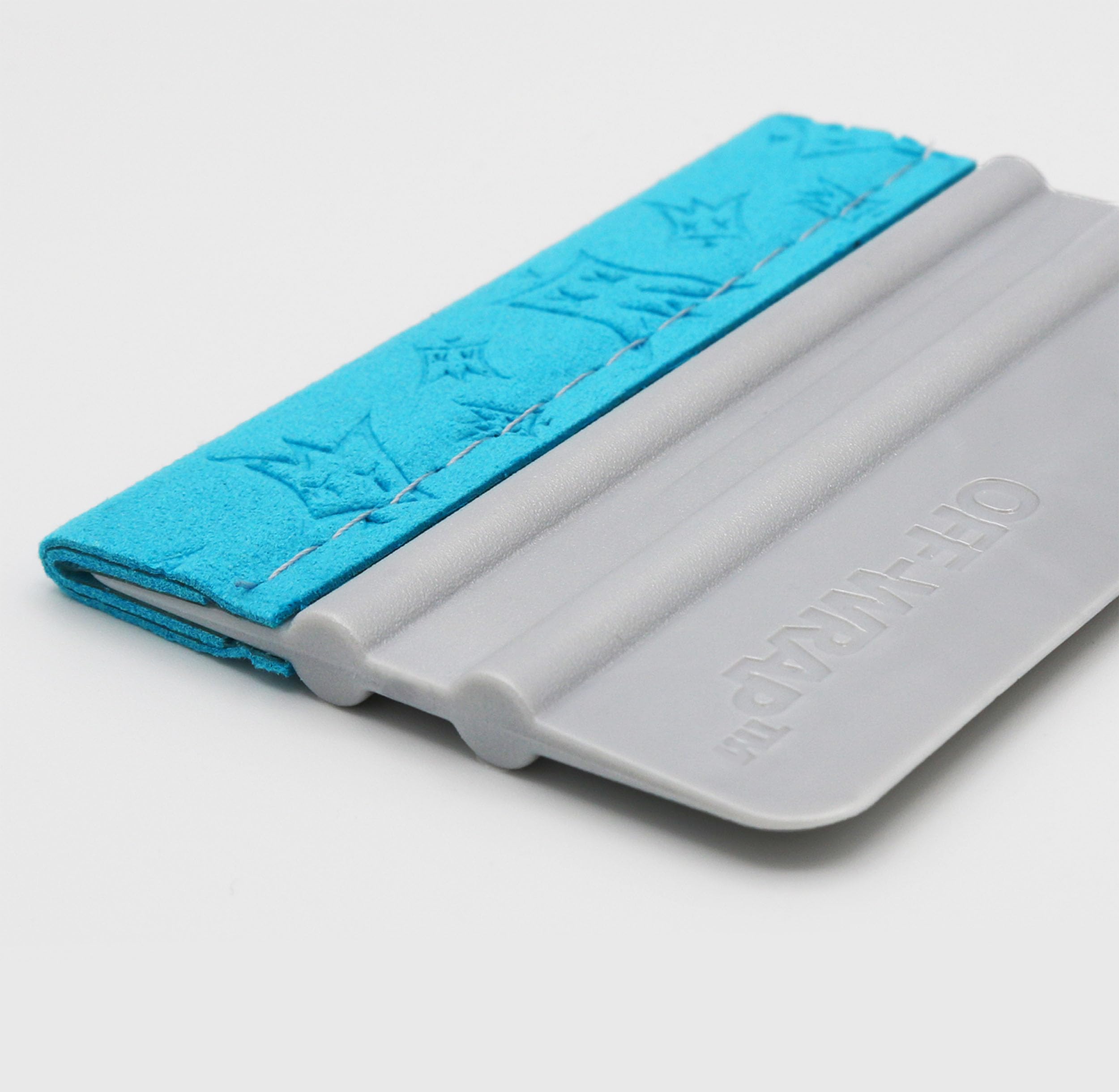 Off-Wrap material texture detail demonstrating durable, solvent-resistant surface