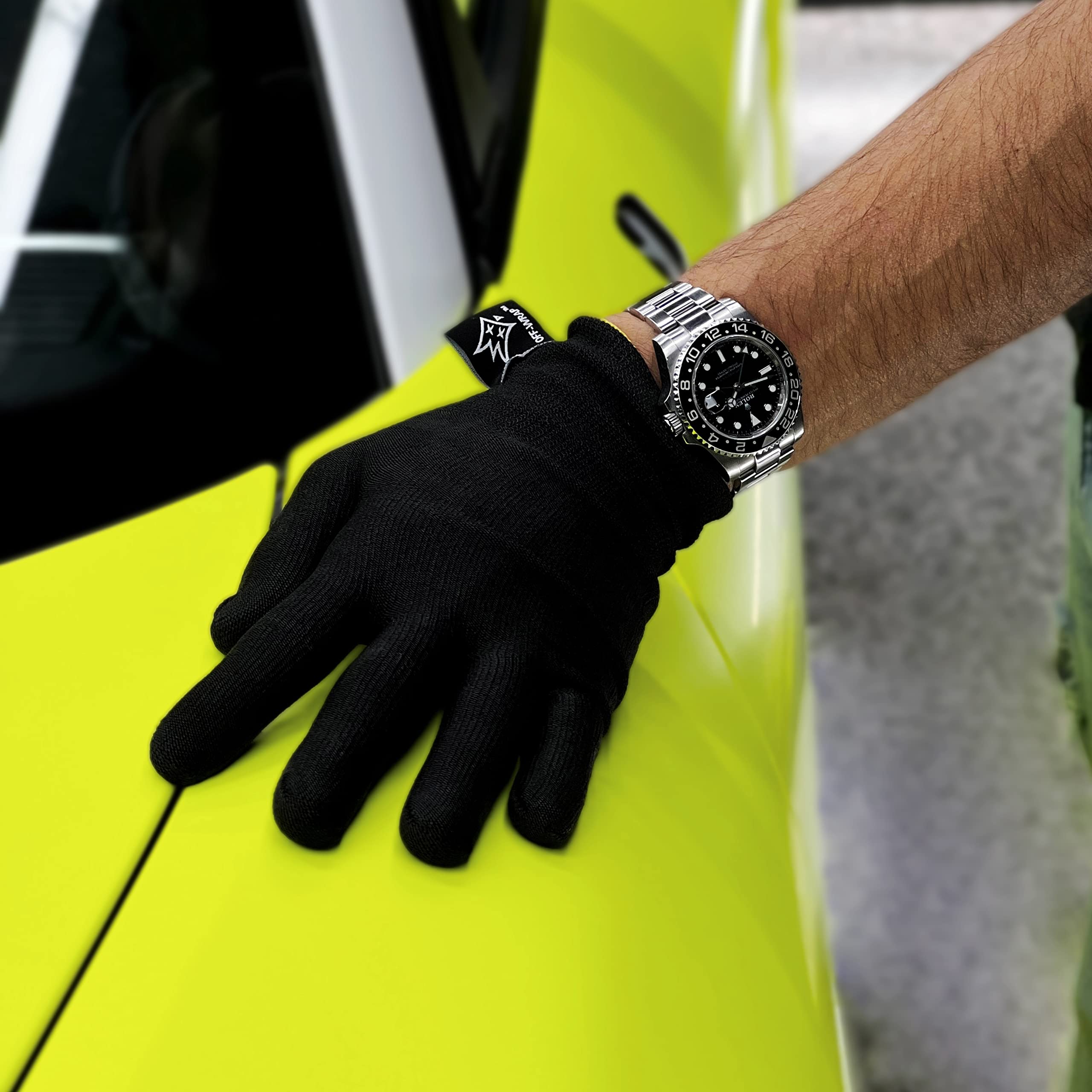 Off-Wrap glove on workbench in wrapping setup showing professional utility