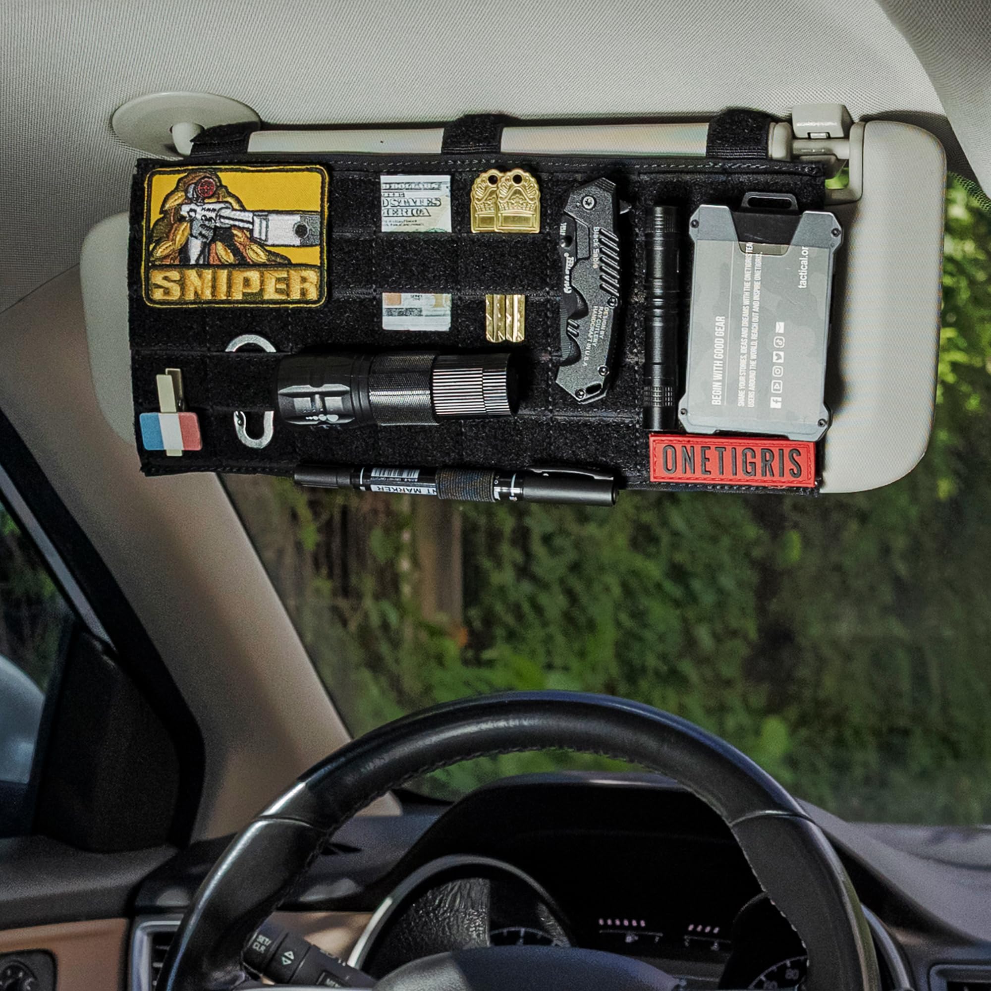 ONETIGRIS adjustable straps securing panel to visor without tools or residue