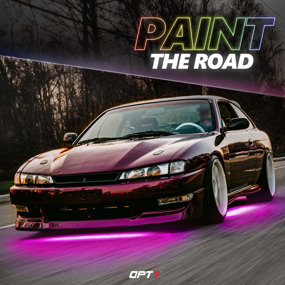 OPT7 Aura Pro night street lifestyle shot showing vivid underglow for visual impact