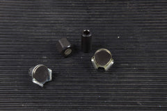 OTC 5961 close-up of three unique attachments for broad plug fitment
