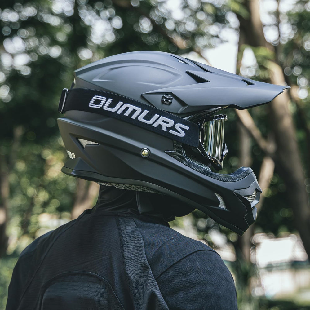 Oumurs helmet on ATV lifestyle image showing real-world riding use