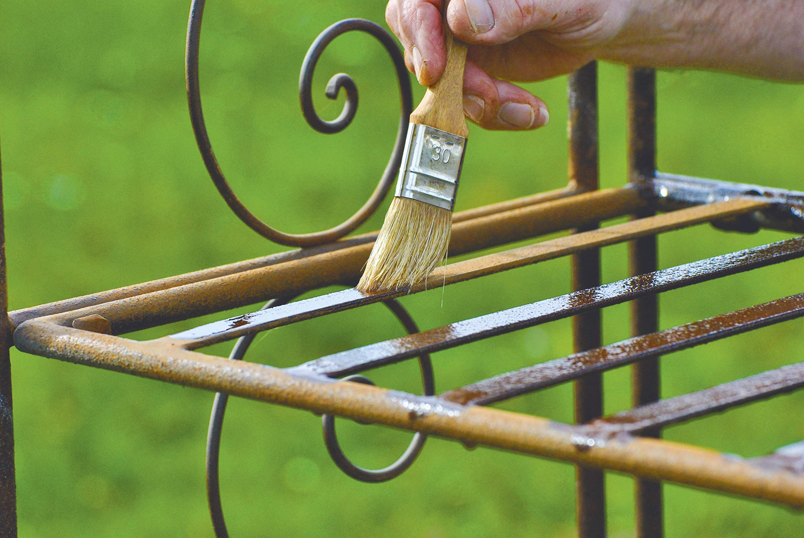 Outdoor furniture treated with OWATROL showing weather-resistant, renewed finish