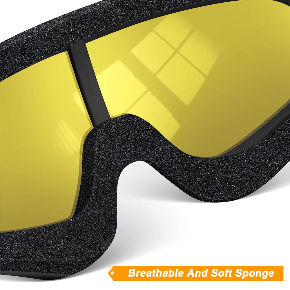 OXG goggles held in hand beside a ruler to show size and scale convenience