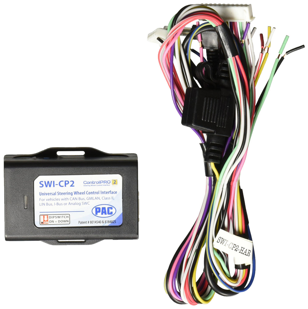 PAC SWI-CP2 next to ruler showing compact size and space-saving design for tight dash spaces