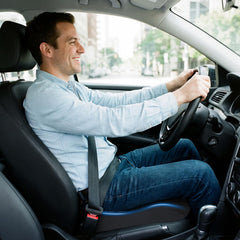Pakanana installed in driver seat improving visibility and posture on road