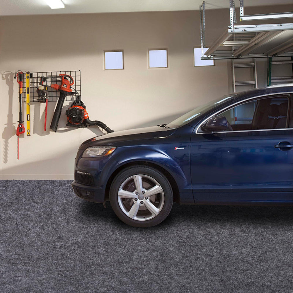 PANDOROOM mat beside a car to show scale and full parking coverage