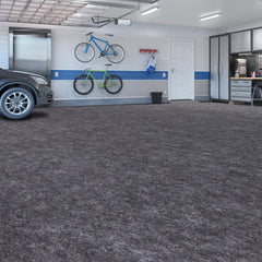 PANDOROOM mat placed under a parked car showing fluid protection benefit