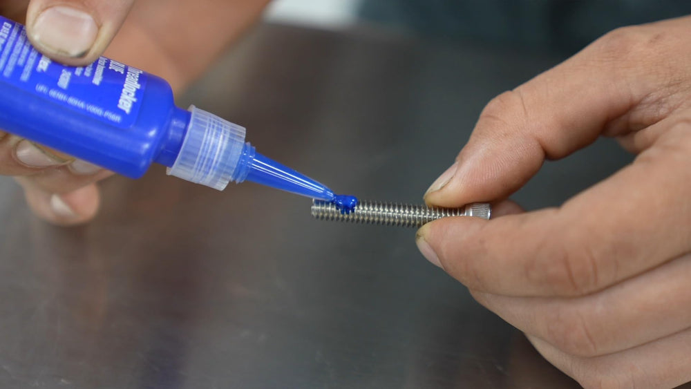 Permatex applied to a bolt threads demonstrating secure application, brand reliability