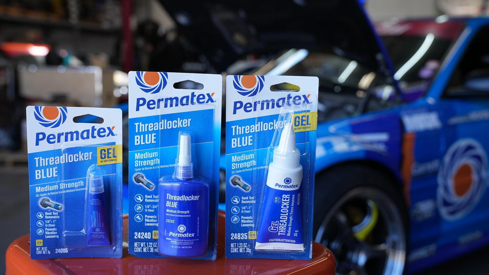 Permatex being used on an engine valve cover bolt, brand prevents loosening