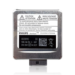 PHILIPS D1S next to hand showing scale and easy OEM replacement