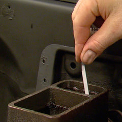Phoenix Systems strip dipped into a brake fluid reservoir demonstrating fast 60-second test