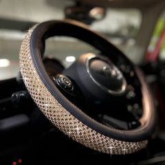 PINCTROT gold steering wheel cover front view shows sparkling rhinestones and polished trim benefiting style
