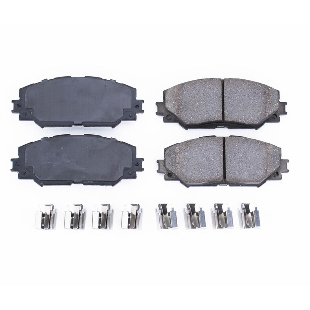 PowerStop pad surface close-up showing chamfered and slotted design, quieter braking