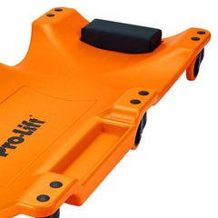 Pro-LifT creeper in use under vehicle providing access and organized tool trays