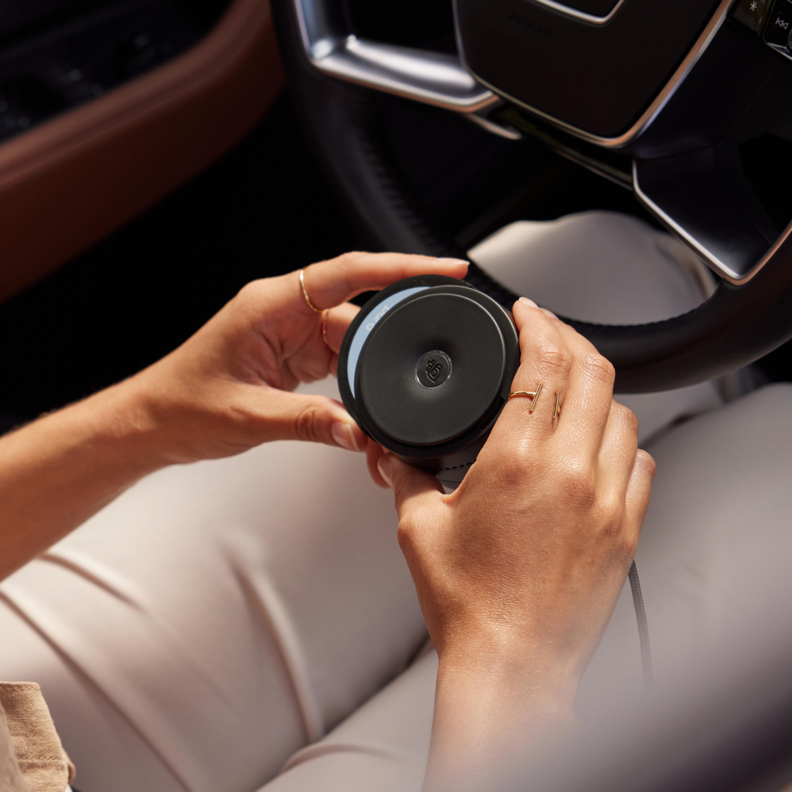 Pura Beach Glow in a car interior lifestyle scene creating welcoming cabin ambience benefit