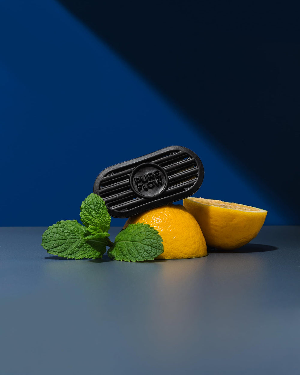 PUREFLOW in vehicle vent with fresh air indicating continuous scent diffusion